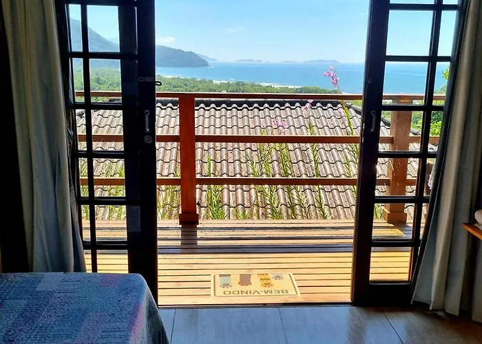 Burung Flats Itamambuca - Hospedagem com vista para o mar